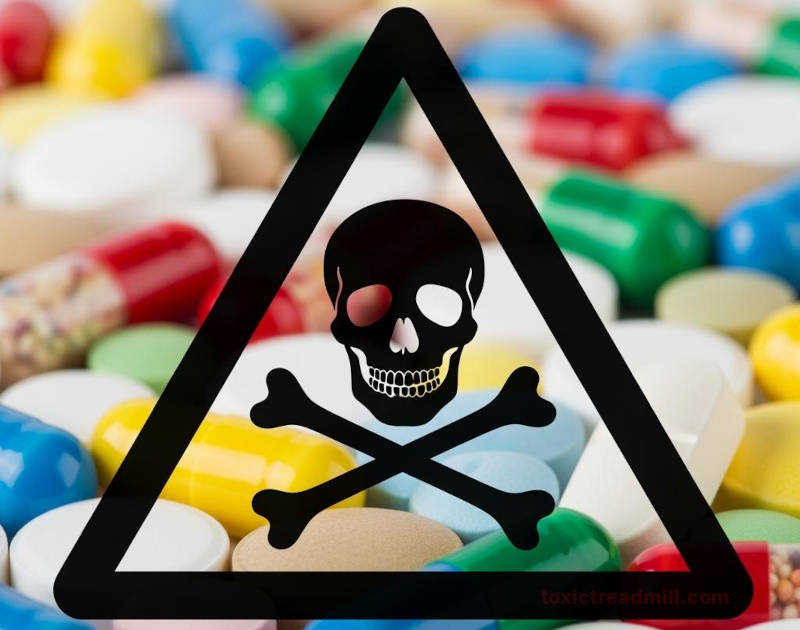 A layer of various capsules and tablets of different colours with a black skull and crossbones warning triangle superimposed